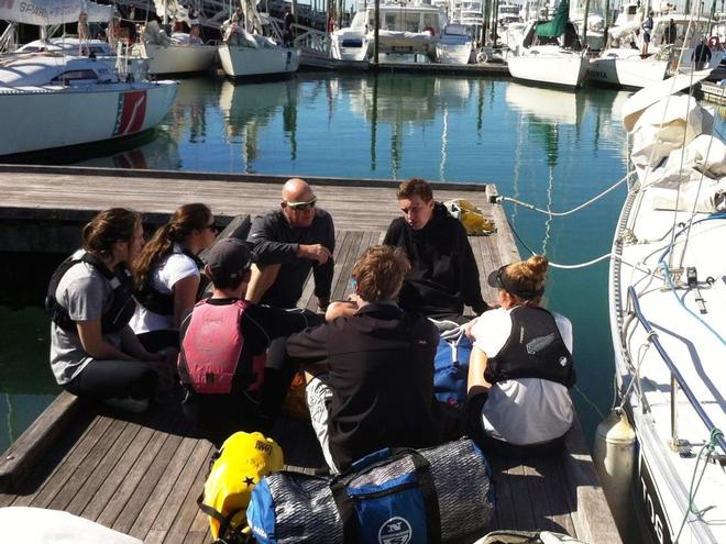 MRX Yachting’s Phil Douglas sharing a few tips with his crew before heading out. - MRX Youth Pathways Regatta © Tom Macky